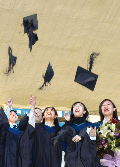Cheers of joy as these university graduates complete years of study