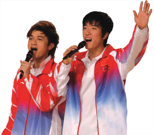 Mainland gold medallist for the 110 metres hurdles event, Liu Xiang, thrills the crowds with Hong Kong singer Leo Ku at the Hong Kong Stadium.